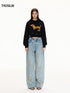 Ink-Splatter Crescent Jeans