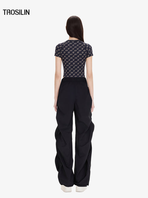 Black all-over print short sleeve bodysuit