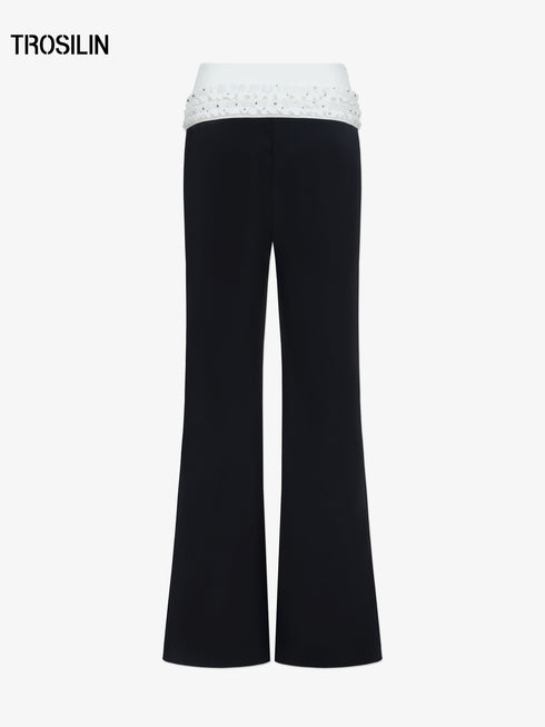 DOTTED LUXE Flared Low-Waist Trousers