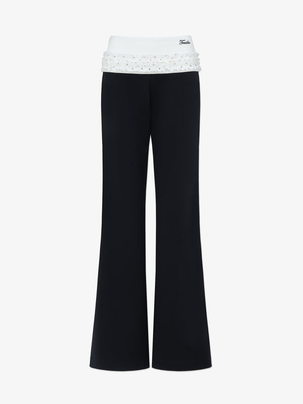 DOTTED LUXE Flared Low-Waist Trousers