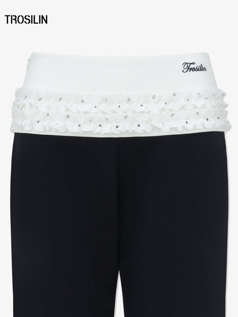 DOTTED LUXE Flared Low-Waist Trousers