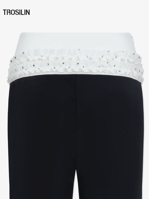 DOTTED LUXE Flared Low-Waist Trousers